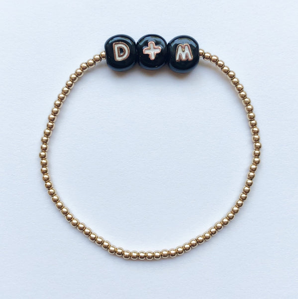 Gold Bracelet with Personalized Black Letter Beads